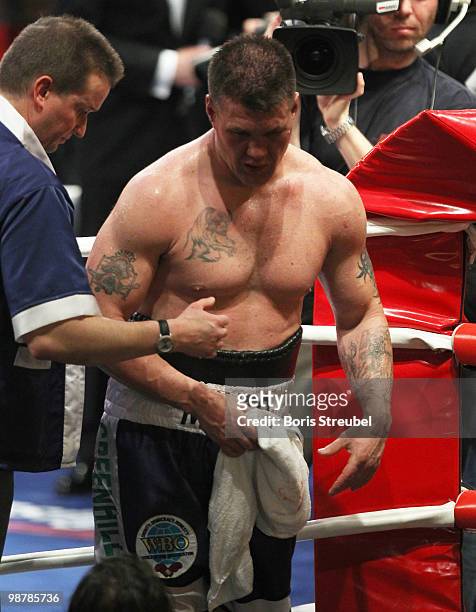 Brian Minto of the U.S. Leaves the ring after loosing the WBO World Championship Cruiserweight title fight against Marco Huck at the Weser-Ems-Halle...