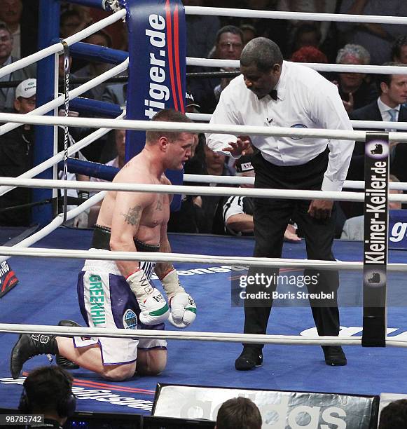 The ringreferre starts giving Brian Minto of the U.S. The count during his WBO World Championship Cruiserweight title fight against Marco Huck of...