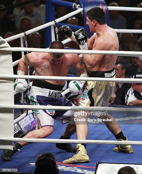 Brian Minto of the U.S. Falls to the ringfloor during his WBO World Championship Cruiserweight title fight against Marco Huck of Germany at the...