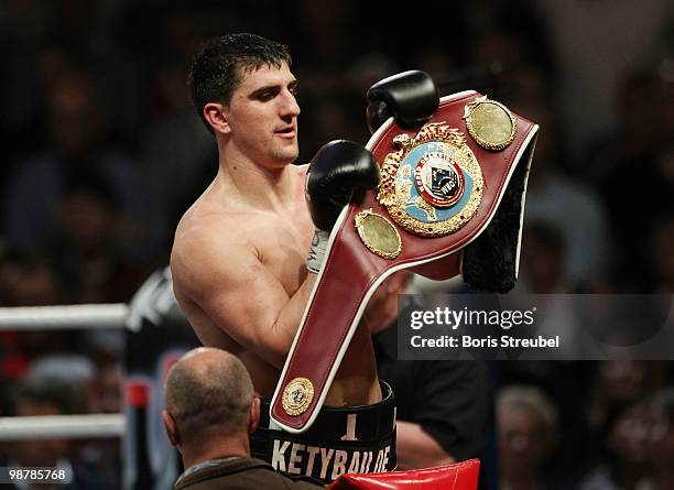 Marco Huck of Germany celebrates after winning the WBO World Championship Cruiserweight title fight against Brian Minto at the Weser-Ems-Halle on May...