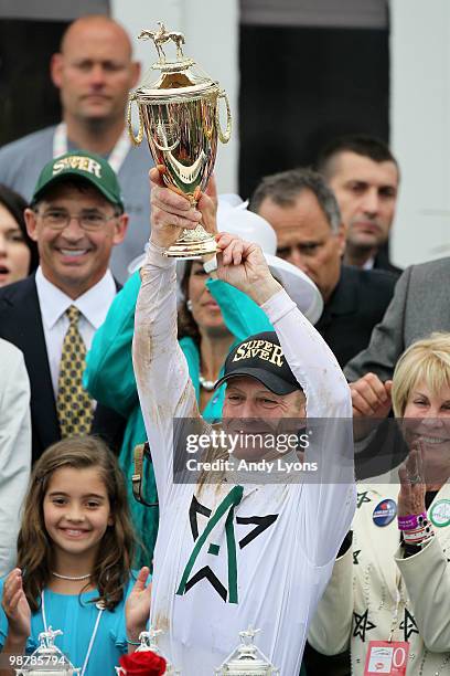 Jockey Calvin Borel holds the 136th Kentucky Derby trophy after his win atop Super Saver on May 1, 2010 in Louisville, Kentucky.