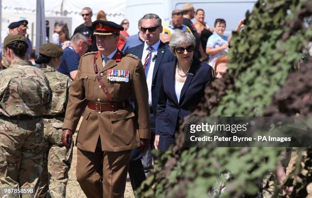Prime Minister Theresa May during the celebrations for National Armed Forces Day in Llandudno, Wales.