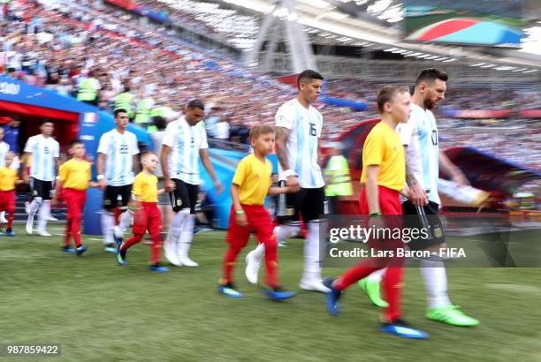 Lionel Messi of Argentina leads his team out prior to the 2018 FIFA World Cup Russia Round of 16 match between France and Argentina at Kazan Arena on...