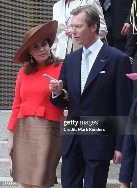 Grand Duchess Maria Teresa of Luxembourg and Grand Duke Henri of Luxembourg leave after attending the inauguration exhibition 'The Golden Age...