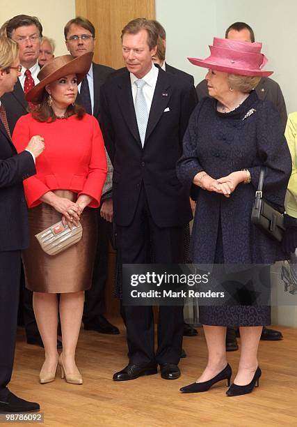 Grand Duchess Maria Teresa of Luxembourg, Grand Duke Henri of Luxembourg and Queen Beatrix of the Netherlands attend the inauguration exhibition 'The...