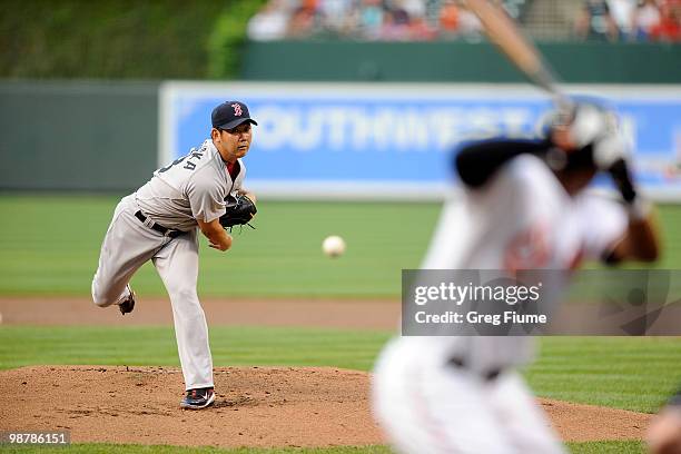 Daisuke Matsuzaka of the Boston Red Sox pitches against Adam Jones of the Baltimore Orioles at Camden Yards on May 1, 2010 in Baltimore, Maryland.