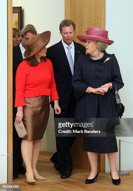 Grand Duchess Maria Teresa of Luxembourg, Grand Duke Henri of Luxembourg and Queen Beatrix of the Netherlands attend the inauguration exhibition 'The...