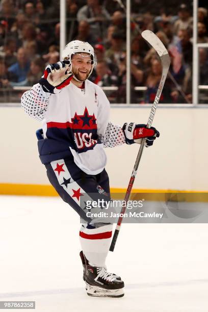 Nathan Walker of the USA celebrates scoring a goal during the Ice Hockey Classic between the United States of America and Canada at Qudos Bank Arena...