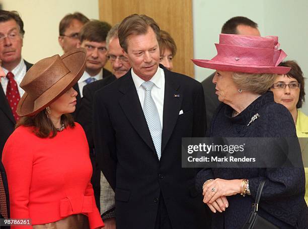 Grand Duchess Maria Teresa of Luxembourg, Grand Duke Henri of Luxembourg and Queen Beatrix of the Netherlands attend the inauguration exhibition 'The...