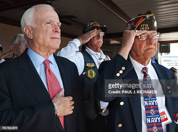 Senator John McCain attends ceremonies at the Veterans of Foreign Wars, the Sandy Coor Post, in Glendale Arizona, as Post Commander Dan Muller, USN...