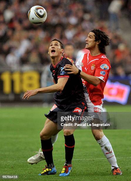Paris Saint-Germain's French midfielder Jeremy Clement battle for the ball with defender of A.S Monaco Francois Modesto during French football cup...
