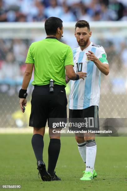 Referee Alireza Faghani speaks with Lionel Messi of Argentina during the 2018 FIFA World Cup Russia Round of 16 match between France and Argentina at...