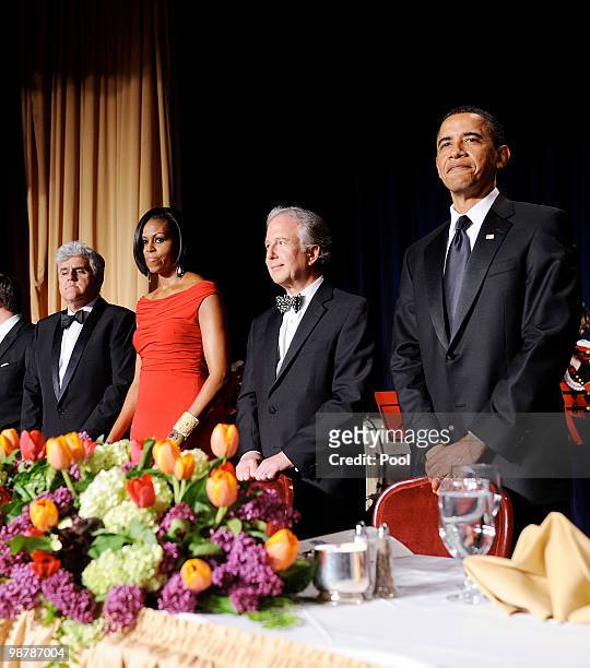 President Barack Obama , Matt Winkler from Bloomberg News ,First Lady Michelle Obama and comedian Jay Leno stand during the White House...