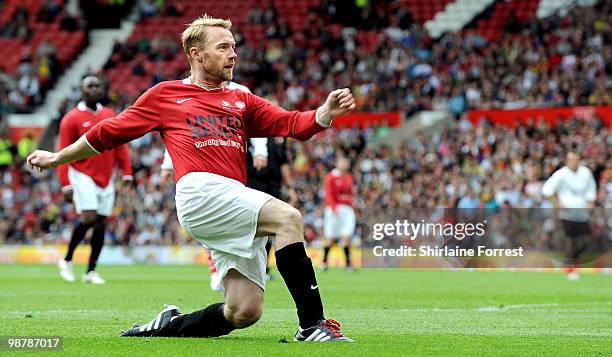 Ronan Keating plays football at United For Relief: The Big Red Family Day Out at Old Trafford on May 1, 2010 in Manchester, England.