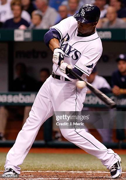 Outfielder Carl Crawford of the Tampa Bay Rays fouls off a pitch against the Kansas City Royals during the game at Tropicana Field on May 1, 2010 in...