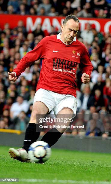 Angus Deayton plays football at United For Relief: The Big Red Family Day Out at Old Trafford on May 1, 2010 in Manchester, England.