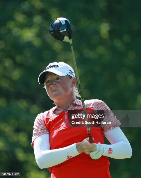 Stacy Lewis hits her tee shot on the ninth hole during the third round of the KPMG Women's PGA Championship at Kemper Lakes Golf Club on June 30,...