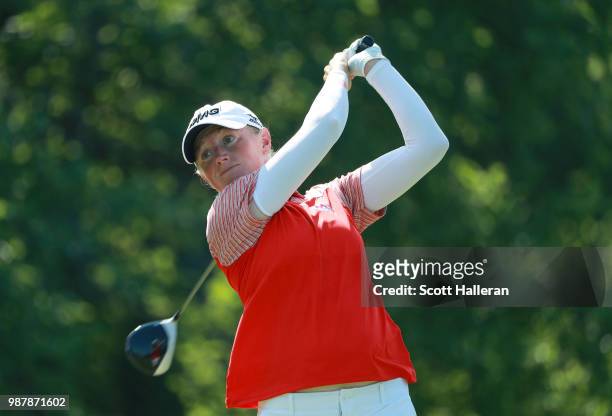 Stacy Lewis hits her tee shot on the ninth hole during the third round of the KPMG Women's PGA Championship at Kemper Lakes Golf Club on June 30,...