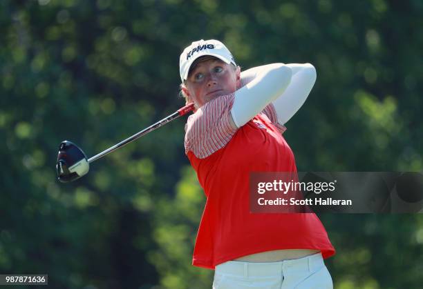 Stacy Lewis hits her tee shot on the ninth hole during the third round of the KPMG Women's PGA Championship at Kemper Lakes Golf Club on June 30,...