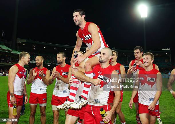 Martin Mattner of the Swans is chaired off the field after his 150th game during the round six AFL match between the Sydney Swans and the Brisbane...