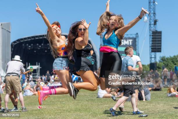 Festival goers jump at the Main stage on the second day of the TRNSMT Festival at Glasgow Green on June 30, 2018 in Glasgow, Scotland.
