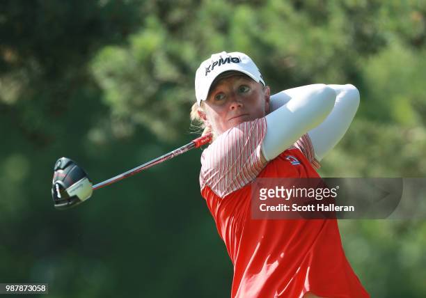 Stacy Lewis hits her tee shot on the eighth hole during the third round of the KPMG Women's PGA Championship at Kemper Lakes Golf Club on June 30,...