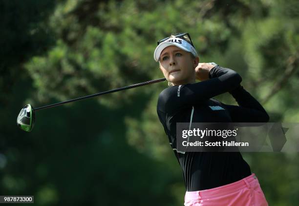 Nelly Korda hits her tee shot on the eighth hole during the third round of the KPMG Women's PGA Championship at Kemper Lakes Golf Club on June 30,...