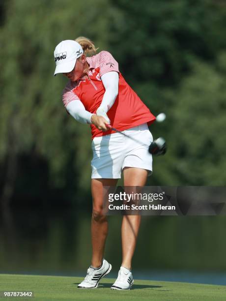 Stacy Lewis hits her tee shot on the seventh hole during the third round of the KPMG Women's PGA Championship at Kemper Lakes Golf Club on June 30,...