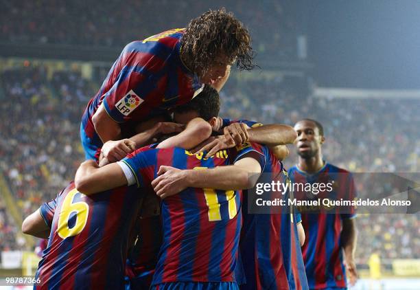 Bojan Krkic of FC Barcelona celebrates with his teammate during the La Liga match between Villarreal CF and FC Barcelona at El Madrigal stadium on...