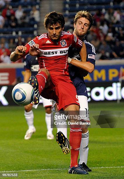 Baggio Husidic of the Chicago Fire is defended by Blair Gavin of the Chivas USA go for the ball in an MLS match on May 1, 2010 at Toyota Park in...