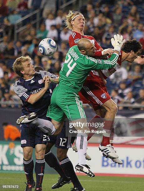 Brek Shea of FC Dallas presses goalie Preston Burpo and defender Seth Sinovic, both of the New England Revolution at Gillette Stadium on May 1, 2010...