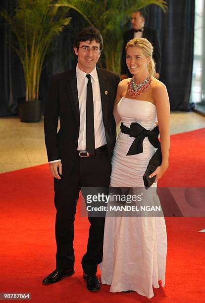 Comedian John Oliver of the Daily Show arrives with an unidentified guest for the 2010 White House Correspondents Dinner May 1, 2010 at a hotel in...