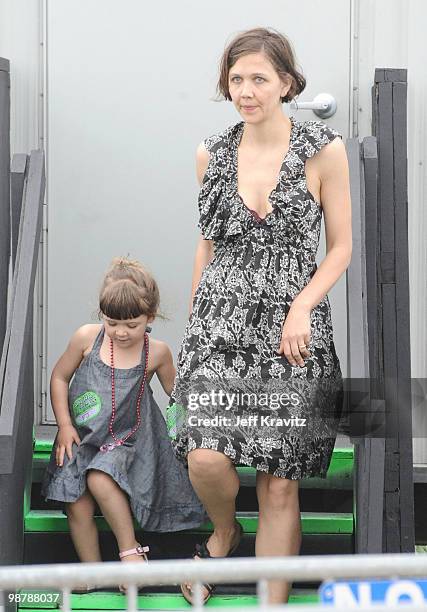 Maggie Gyllenhal and daughter during the 41st Annual New Orleans Jazz & Heritage Festival Presented by Shell at the Fair Grounds Race Course on May...