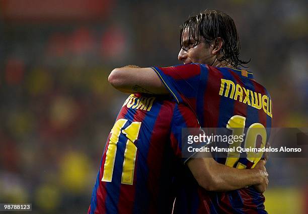 Maxwell of FC Barcelona celebrate with his teammate Bojan Krkic during the La Liga match between Villarreal CF and FC Barcelona at El Madrigal...