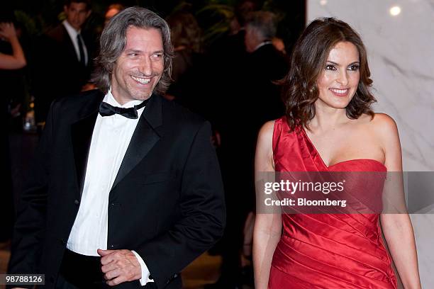 Actress Mariska Hargitay, right, and her husband Peter Hermann arrive for the White House Correspondents' Association dinner in Washington, D.C.,...