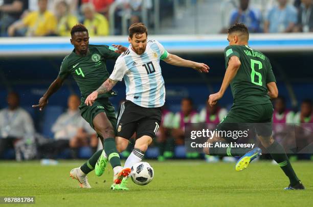 Lionel Messi of Argentina takes on Leon Balogun of Nigeria during the 2018 FIFA World Cup Russia group D match between Nigeria and Argentina at Saint...