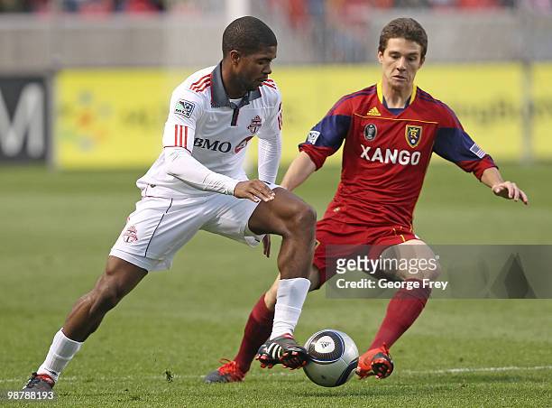 Will Johnson of the Real Salt Lake fights for the ball with Joseph Nane of Toronto FC during the first half of an MLS soccer game on May 1, 2010 in...