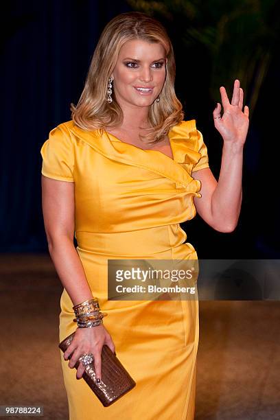 Recording artist Jessica Simpson arrives for the White House Correspondents' Association dinner in Washington, D.C., U.S., on Saturday, May 1, 2010....