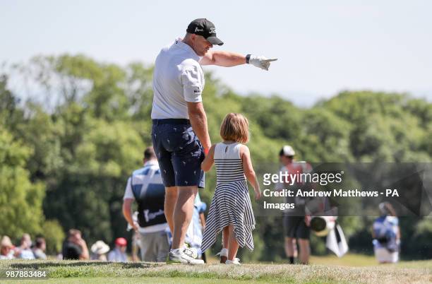 England's Mike Tindall with his daughter Mia, during the Celebrity Cup charity golf tournament at The Celtic Manor Resort in Newport.