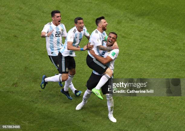 Gabriel Mercado of Argentina celebrates with teammates after scoring his team's second goal during the 2018 FIFA World Cup Russia Round of 16 match...