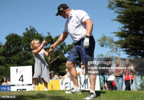 England's Mike Tindall with his daughter Mia, during the Celebrity Cup charity golf tournament at The Celtic Manor Resort in Newport.