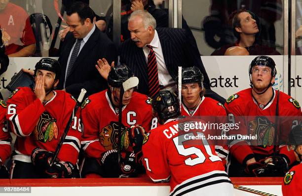 Head coach Joel Quenneville of the Chicago Blackhawks gives instructions to Andrew Ladd, Jonathan Toews, Brian Campbell, Patrick Kane and Bryan...