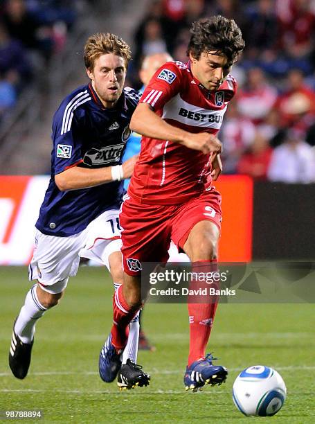 Baggio Husidic of the Chicago Fire is defended by Blair Gavin of the Chivas USA go for the ball in an MLS match on May 1, 2010 at Toyota Park in...