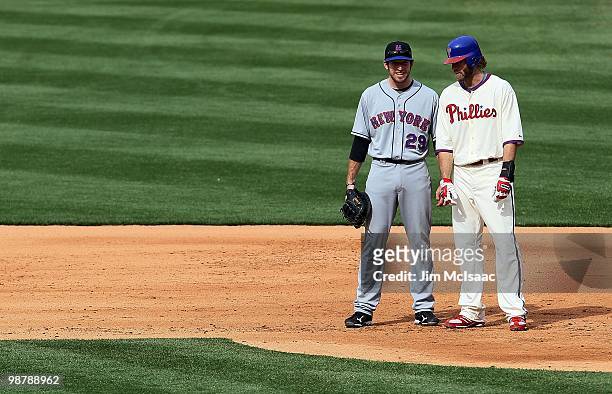 Jayson Werth of the Philadelphia Phillies talks with Ike Davis of the New York Mets during their game at Citizens Bank Park on May 1, 2010 in...