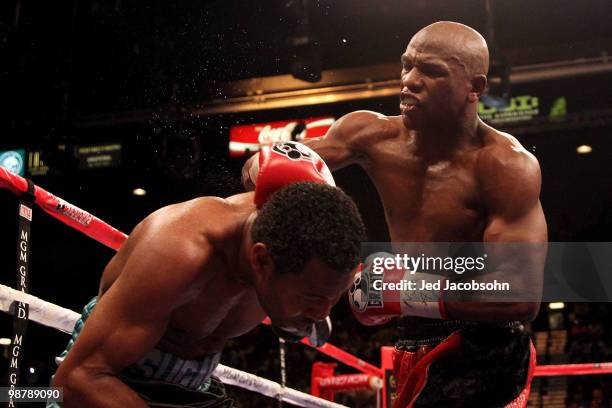 Floyd Mayweather Jr. Throws a right to the head of Shane Mosley during the welterweight fight at the MGM Grand Garden Arena on May 1, 2010 in Las...