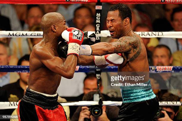 Floyd Mayweather Jr. Connects with a left to the body of Shane Mosley during the welterweight fight at the MGM Grand Garden Arena on May 1, 2010 in...