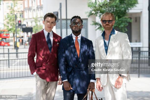 Digital Influencer Mathias le Feuvre wears an Alexandre Wood jacket, trousers and tie, Eaton shirt with Fashion stylist Edmond Kamara wearing a Saran...