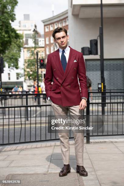 Digital Influencer Mathias le Feuvre wears an Alexandre Wood jacket, trousers and tie, Eaton shirt and Camina shoes during London Fashion Week Men's...