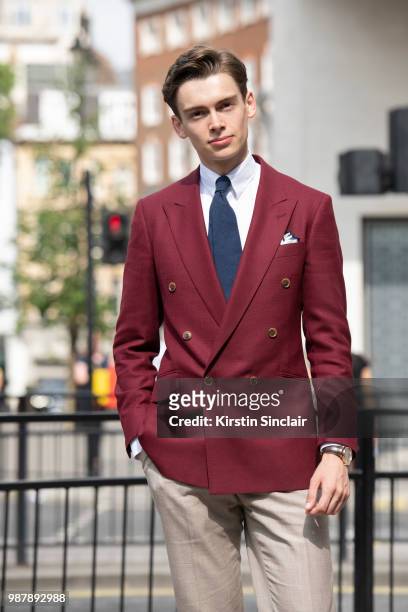 Digital Influencer Mathias le Feuvre wears an Alexandre Wood jacket, trousers and tie, Eaton shirt during London Fashion Week Men's on June 10, 2018...