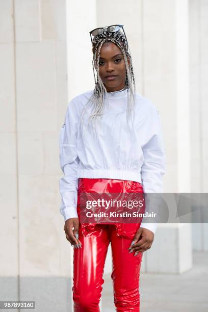 Fashion designer Shanice Palmer wears all her own design clothing during London Fashion Week Men's on June 10, 2018 in London, England.